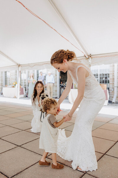 Brides under an arch at historical building in New York