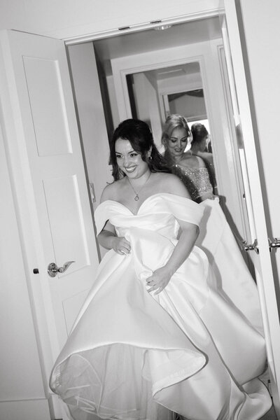 Candid moment of bride and mother captured by Oahu wedding photographer.