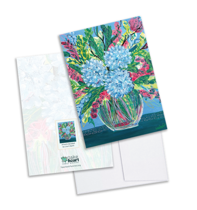 Front of greeting card with a painting of a blue hibiscus floral arrangement in a glass vase.