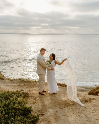 bride and groom hugging