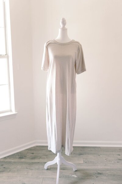 Women's long light gray T-shirt dress.