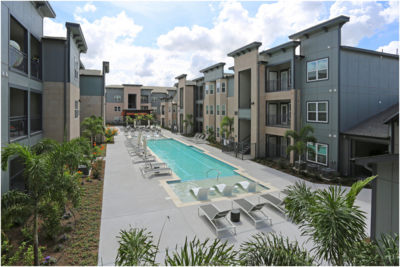 Pool area at Mirabella Apartments in McAllen Texas featuring luxury outdoor amenities and well maintained spaces managed by WLS Interests.