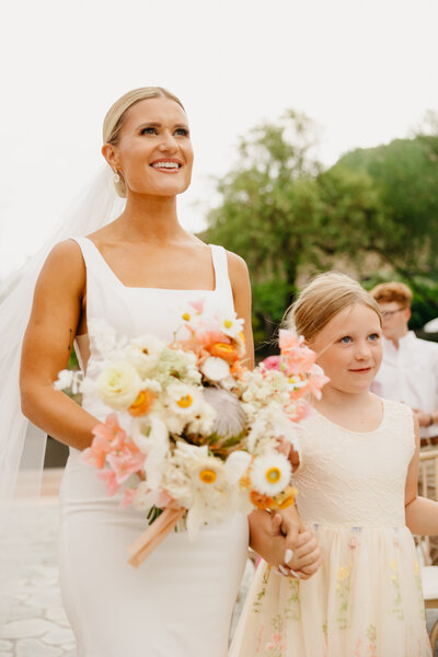 a bride holding flowers