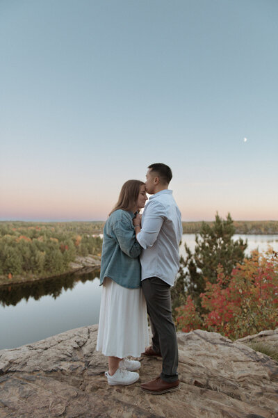 A couple standing close together documented by a Sudbury Documentary Photographer
