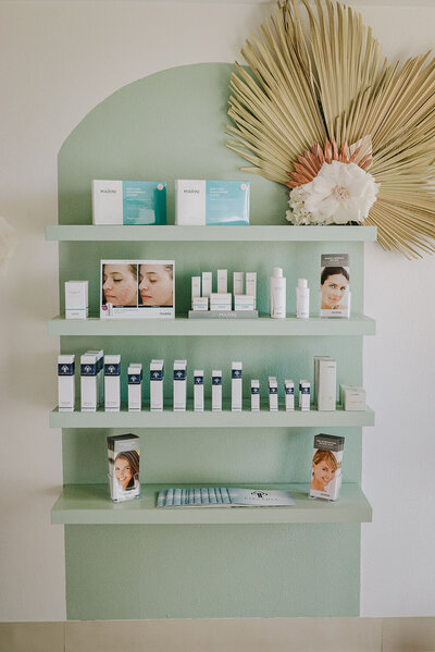 A product wall displaying our highly recommended products located in our San Diego spa