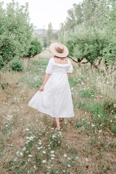 Tiffany Longeway, the acclaimed photographer specializing in luxury weddings. Her headshot reflects the artistic vision and dedication she brings to capturing love stories with elegance and creativity.