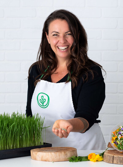 classic studio headshot  wit subject smiling at camera