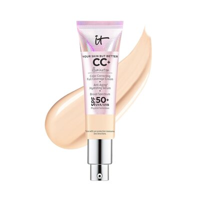 Tube of IT Cosmetics CC+ Cream SPF 5 with a swatch of tinted moisturizer in a warm nude tone
