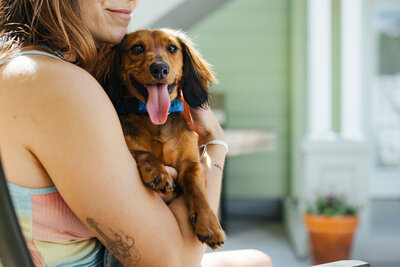 Woman with her dog posing for portrait in St Pete FL
