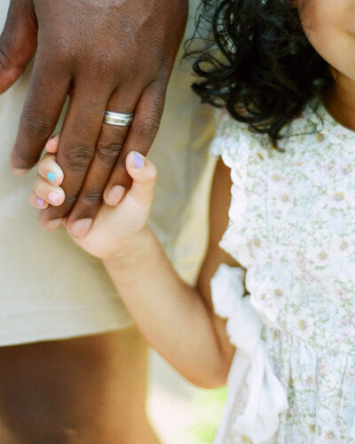 father and daughter holding hands film scan by huntsville family photographer