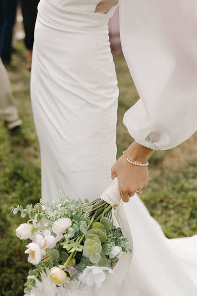 A bride and her flowers The Era Wedding & Event Venue