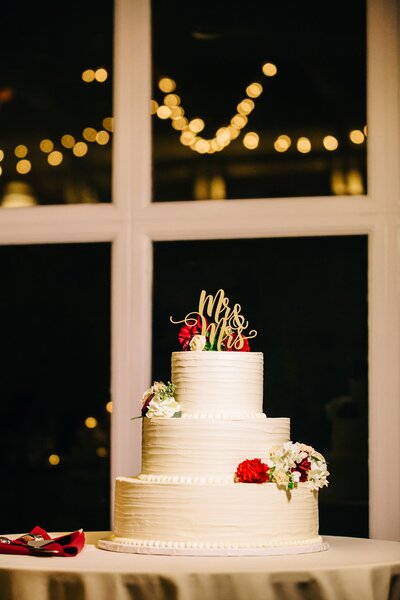 Alexa Nahas standing in soft natural light, during a wedding shoot in Philadelphia.