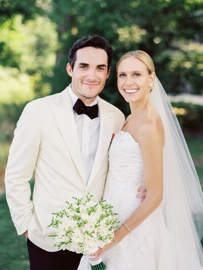 Close up of the bride and groom at the Shoreacres Country Club. 