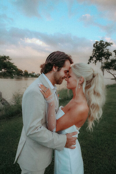 Bride with a high ponytail and soft, cascading waves — playful and polished bridal hair by Klover Beauty for a Maryland wedding.