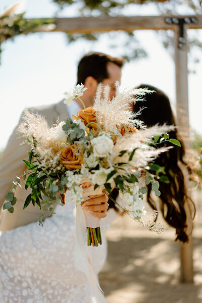 couple walking on dirt path