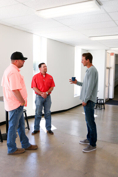 Men meet in the hallway to chat - Restoration