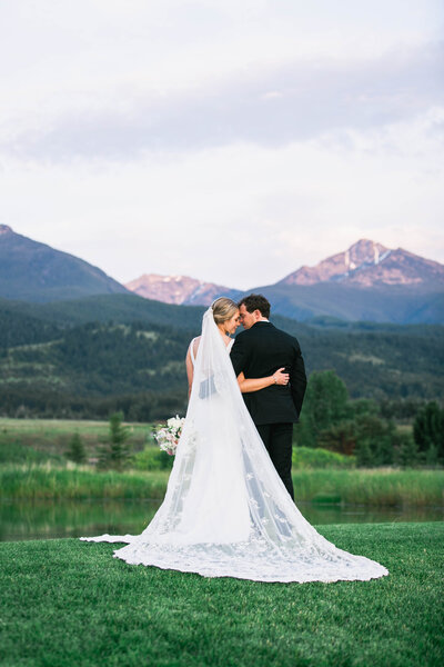 bride and groom embracing