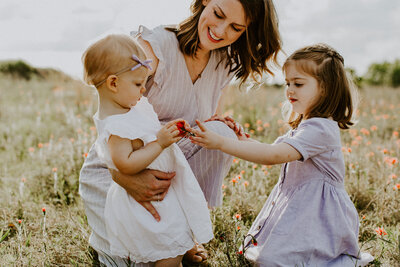 Mother with two young children