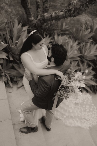 A photo from a Bellingen elopement with a bride and groom looking at each other with love