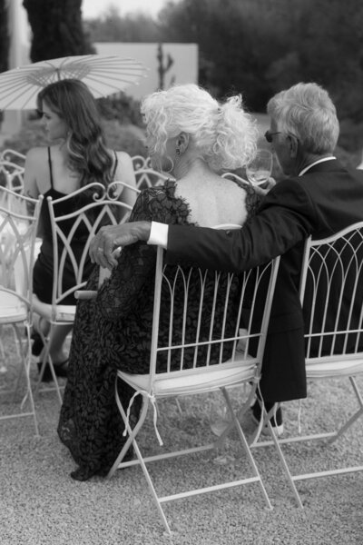 guests hugging at ceremony