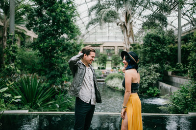 Stylish couple photographed inside Longwood Gardens, photography by Sweetwater Portraits.