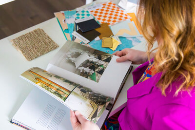Woman looking at book