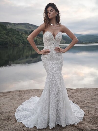 Strapless Sheath Bridal Gown. This is geometric lace for your Vie Bohème. Easy-breezy comfort for ceremony and reception. A strapless sheath bridal gown for your happily ever after.