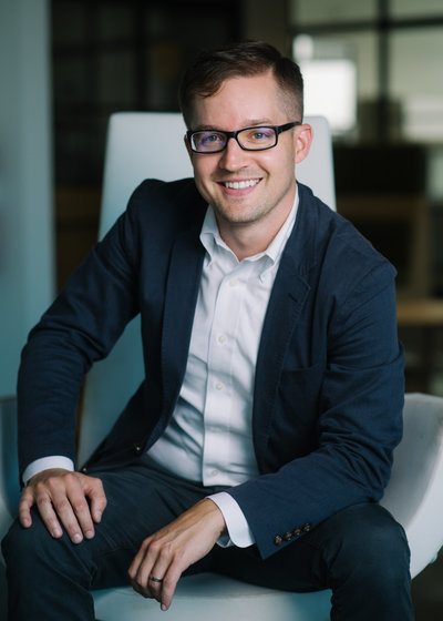 Bradley Burckel with wife and children at home in Birmingham, Alabama