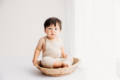 Hudson during his baby milestone photoshoot with auckland photographer michelle kelly photography