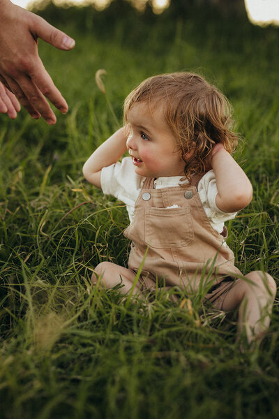 father reaching out to his son