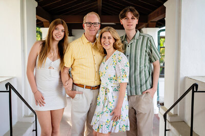 The Lohman family standing together, representing the owners of a local, family-run East Bay home improvement company.