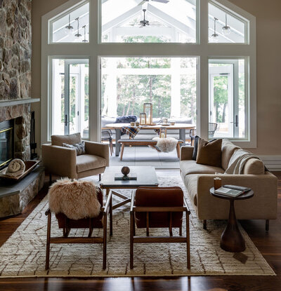 Lake House Retreat in the Berkshires with a large picturesque window and open seating living area.