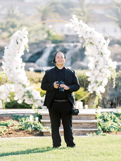 Arjay Moreno standing in front of a beautiful ceremony setup at the Silver Creek Country club in San jose california