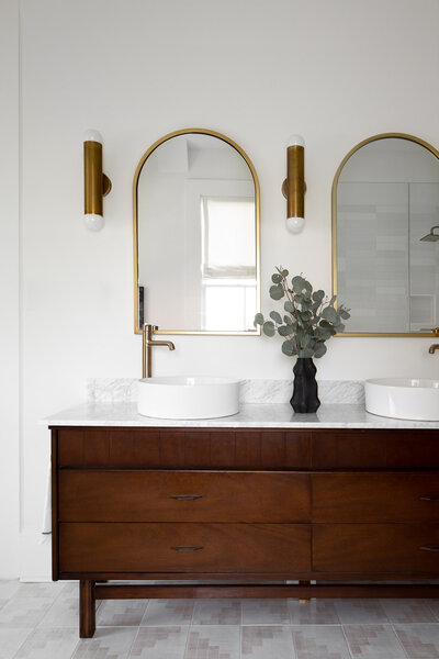 Bathroom brown vanity with mirrors