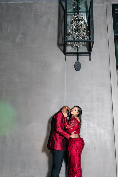 Image of black couple standing on the rocks on folly beach, black couple engagement session