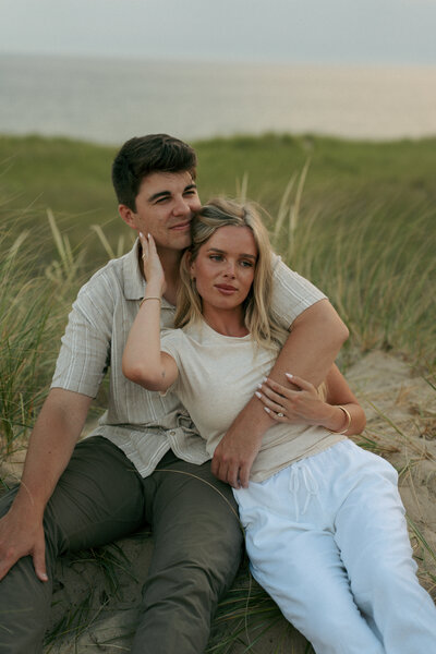 man hugging woman from behind