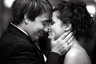 Couple lovingly embracing during first dance at Southern Oaks