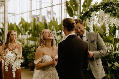 Romantic greenhouse wedding ceremony at the Grand Rapids Downtown Market.