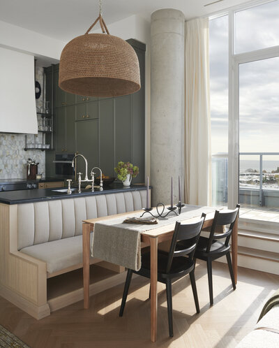 bright white coastal kitchen quartz marble counters subway tile backsplash chrome accents gold lighting