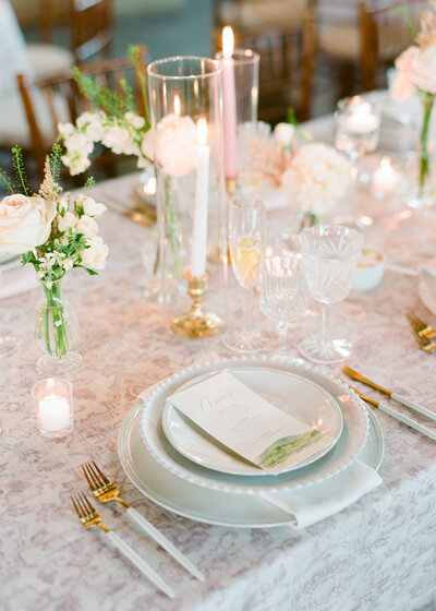 Blush wedding linen with white plates