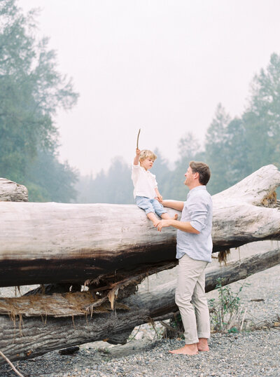 Seattle family photos at foggy river captured on film.