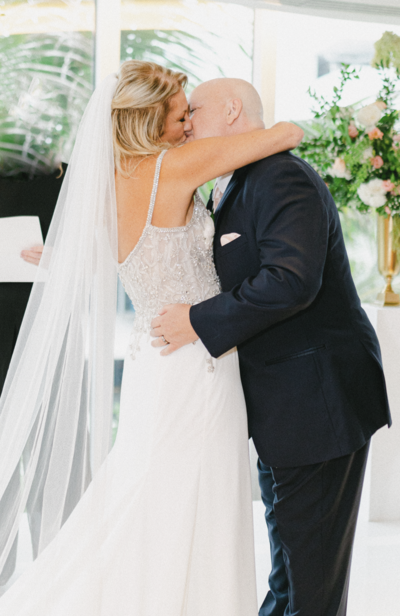 Renee and Ken having their first kiss.