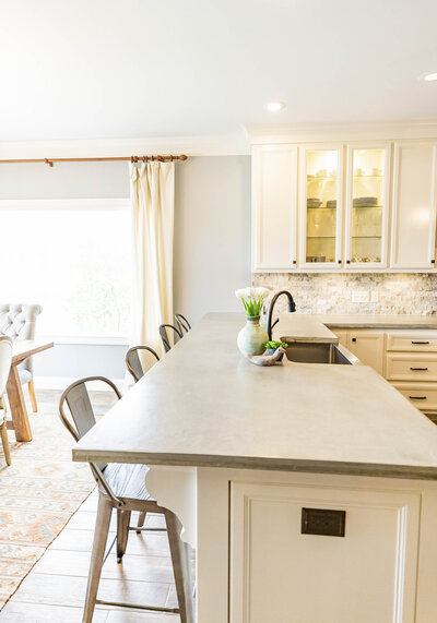 beautiful-kitchen-renovation-white-cabinets-grey-counters-brick-floors1