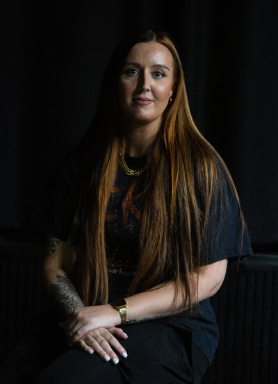 Trainer doing deadlifts