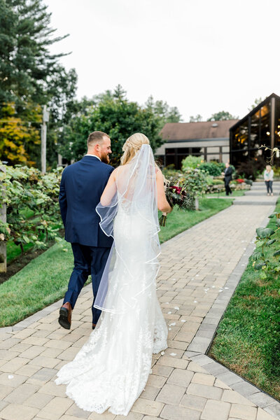 Birch Wood Vineyards  - Couple Walking Towards the Wedding Venue