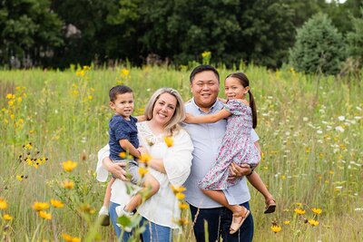 professional potrait of dad, mom and  toddler boy in Chicago-area fall family mini session