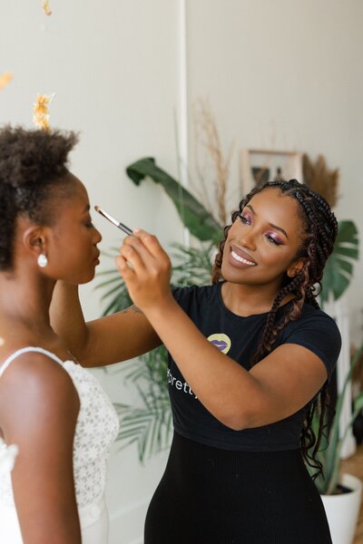 Luxury Makeup Artist Tina Barnes Applying Makeup To A Bride