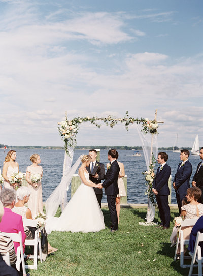 Waterfront ceremony blush wedding at Chesapeake Maritime Museum