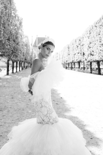 A wedding photo of the couple in the streets of Paris France