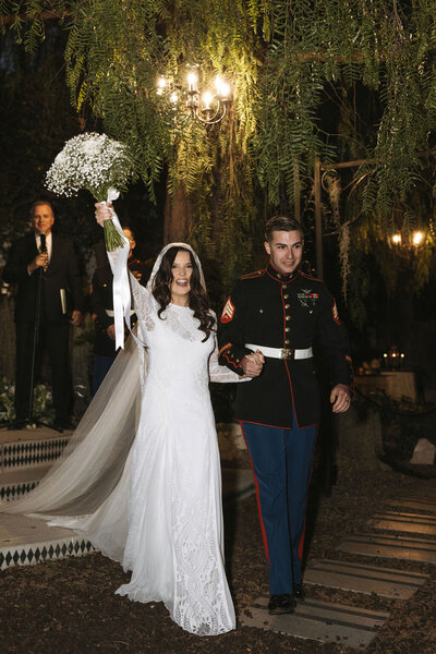 Bride and groom exit their wedding ceremony at Sepulveda Home, coordinated by Southern California wedding planner Beyond the Event and photographed by Maelani Janel Photo.